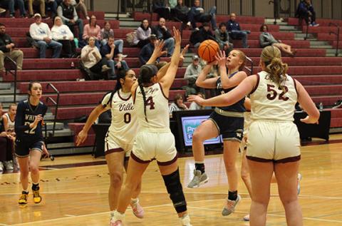 Ella Kate Shedd puts up a shot during the first half of the region game last week against Dawson County. (Photo/Mark Turner)