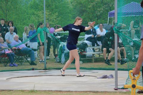 Cierra Bailey throws the discus.