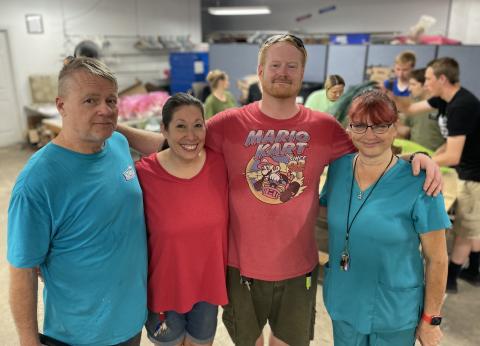 His Hands and Feet Ministry Thrift Store’s monthly food drive is managed by, left to right, Rob Efferson, Shauna Efferson, Scotty Splittorff, and Lisa Ferrari. (Jerry Grillo photo))