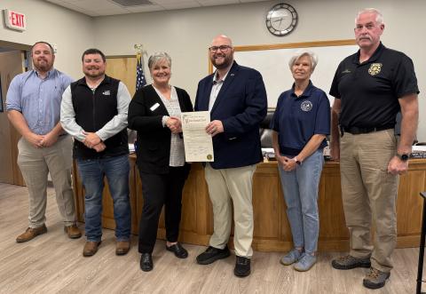 The City of Cleveland proclaimed September as Domestic Violence Awareness Month. From left are commissioners C.J. McDonald and Jeremy McClure, Michelle Black, Resource Development Manager for Circle of Hope, Mayor Josh Turner, Commissioner Nan Bowen and Cleveland Police Chief Jeff Shoemaker. LINDA ERBELE/WCN