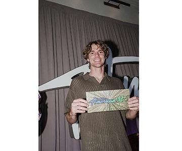 Eli Palmer, a WCHS graduate, shows off the Golden Ticket he got through American Idol. SUBMITTED