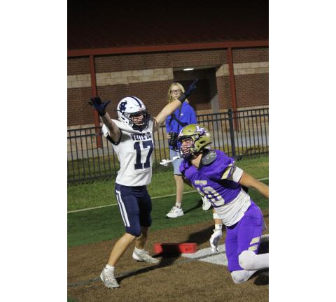 Carrson Ward celebrates after knocking away a pass in the end zone late in the first half. MARK TURNER/WCN