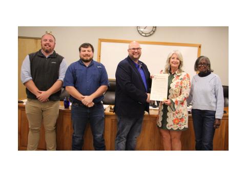 From left, council member CJ McDonald, council member Jeremy McClure, Mayor Josh Turner, White County Chamber of Commerce President Beth Truelove and council member Annie Sutton present the Farm-City Week Proclamation. CARLY HENDERSON/WCN