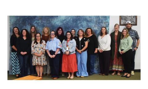 Paraprofessionals in a teacher apprenticeship program, along with their teacher mentors, are recognized during the Nov. 20 school board meeting. DENISE ETHERIDGE/WCN