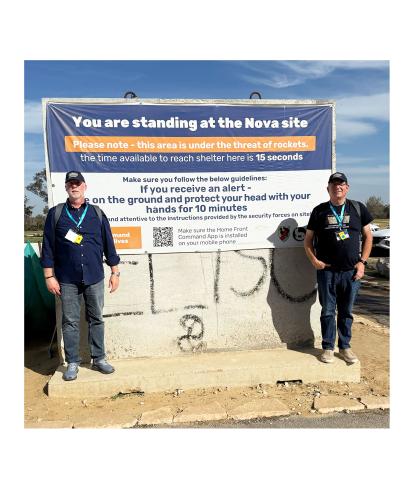Pastor David Sansot, left, and Pastor Avery Hutto of The Bridge Church in Cleveland stand at the Nova site in southern Israel, where Hamas operatives attacked on Oct. 7, 2023. See more Summit photos on page 6A. SUBMITTED PHOTO