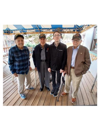 From left, Andy Negra, Hilbert “Hibby” Margol, Caleb Schneider and Alan Kinder gather following lunch. Schneider, 14, raises money for his Lunch with Veterans program through donations through his radio station, G.I. Jive Radio. SUBMITTED PHOTO