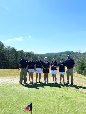 Members of the Mountain League championship girl's team are, from left, Coach Jon Kostulakos, McKinley Holland, Anley Kennedy, Grace Hollis, Emily Ransom, Reagan Turner and Coach Dillon Wilson. Hollis was the tournament's low-medalist in the girl's division.