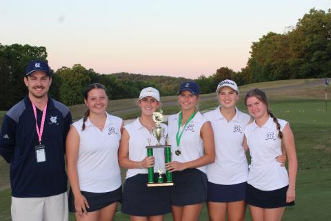 The Lady Warriors show off the Area 3 team trophy folliwing the tourament Monday at Chestatee Golf Club In Dawsonville. Show are, from left, WCHS head coach William Bagwell, Addison Schindler, Emma Rogers, Maddie Kate Hall, Lily Ellis and Annabelle Head.  WCHS GOLF/SPECIAL