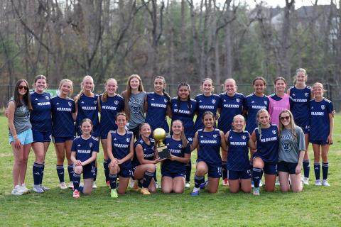 The Lady Warriors show off the NGML trophy after beating Lumpkin County 4-1 in the championship game last week at the WCMS Warrrior Stadium. JENNIFER KNIGHT/SPECIAL