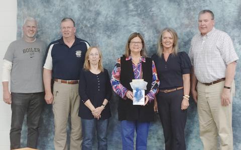 The White County Board of Education thanked former Superintendent Laurie Burkett for her years of service to the school system on March 26. From left: School Board Members Jon Estes, Charlie Thomas and Linda Erbele, Burkett, School Board Chair Missy Jarrard and School Board Member John Solmon. DENISE ETHERIDGE/ WCN
