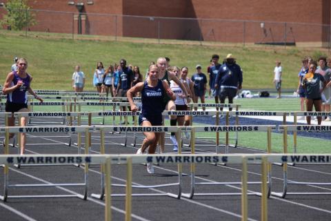 Katana Rickett won the 100-meter hurdles during the final day of the region meet. MARK TURNER/WCN