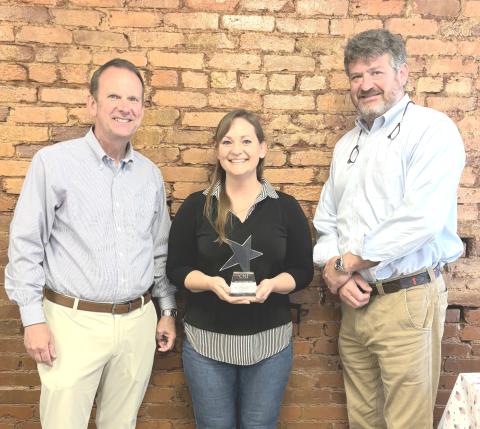 White County News general manager and marketing specialist Erin Etris, center, received the Tom Tucker All-Star award for 2025 on June 3. Regional Publisher Keith Barlow is at left, and CNI Chairman Alan NeSmith is at right. CARLY HENDERSON/WCN