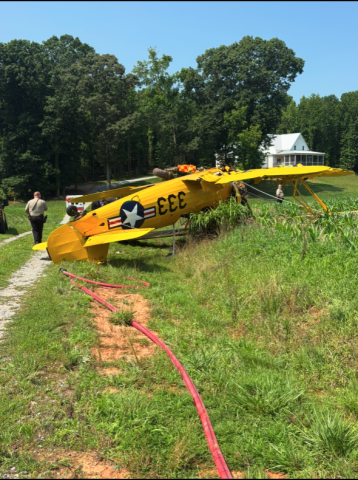 A Boeing PT-17 crashed in a field along Black Road in Cleveland on Friday morning. SUBMITTED PHOTO 