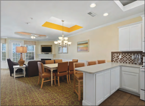 A dining room and kitchen is shown in one of the presidential penthouses, which are now long-term rentals at the Apple Mountain Golf Club and Resort, recently purchased by BQA 4 LLC. HANNAH CAUDELL/CNI