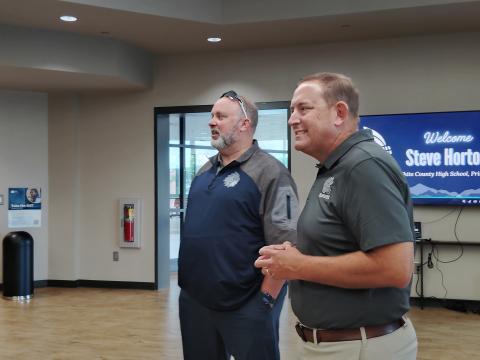 WCHS principal Steve Horton, left, and superintendent Dr. Jonathan Stribling welcome visitors during a recent meet and greet for Horton.  DENISE  ETHERIDGE/WCN