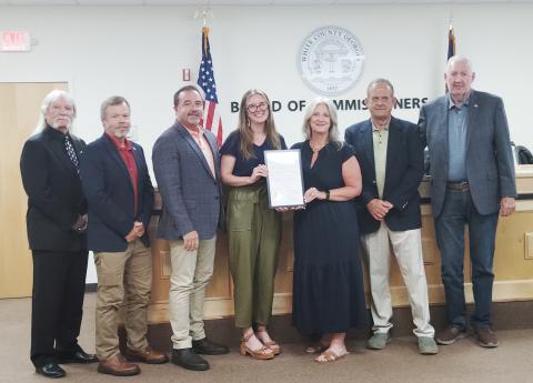 From left: Commissioners Craig Bryant and Shan Ash, Chairman Travis Turner, Ellis, Truelove, and Commissioners Lyn Holcomb and Ed Nix. DENISE ETHERIDGE/WCN