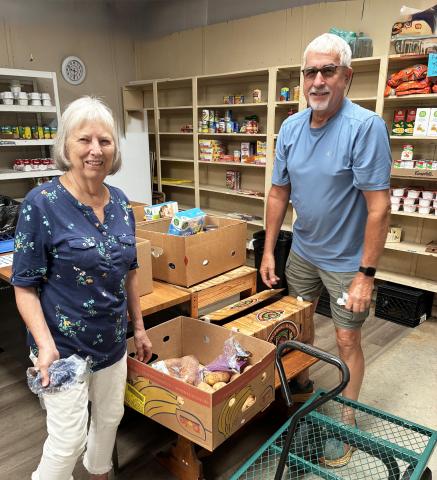 White County Food Pantry volunteers Pat Roland, left, and Richard Ingels put food boxes together for clients. SUBMITTED PHOTOS