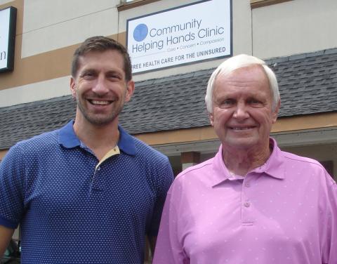 Standing in front of the Community Helping Hands Clinic are Dr. James Murphey, left, and clinic executive director Gene White. FILE PHOTO