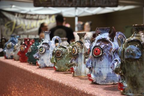 Glistening face jugs by potter Heather Elyse Head were on display inside the Historic Gym last Saturday. PHOTOS BY DENISE ETHERDGE/WCN