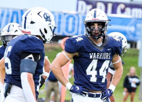 Senior Sam Harkins, above, and the Warriors' defense will try and slow down the Bobcats' potent offense in the region opener. STACI SULHOFF/SPECIAL