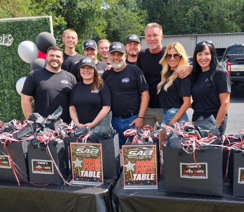 Pictured from left to right are Shane’s Auto Body employees Blake Slaton, Harrison Harper, Stacy Mitchell, Preston McGatha, Cash Laws, Mike Baker, Reese Alexander, Owner Shane Palmer, his wife Farrah Palmer and Office Manager Tina Blackburn. Not pictured are Howard England, Don Lepkoske, Mason Palmer, and Barrett Palmer. PHOTOS BY ERIN ETRIS