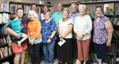  Front row, from left, Gina Sherman, Gail Smith, Jackie McDaniel, Amanda Lammers, Kim Sosebee and Tami Tarell. Back row, from left, Frank Norrell, Matthew Norrell, Tim Skidmore and Gene White. The group is pictured at the Community Thrift Store in Cleveland during the Sept. 17 grant awards. CARLY HENDERSON/WCN