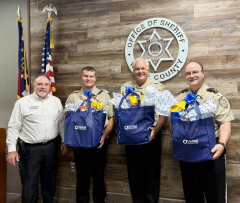 From left: United Community Bank President Donald Harris, Deputy Josh Fredrick, Sheriff Rick Kelley and Lt. Tim Chapman. SUBMITTED PHOTOS