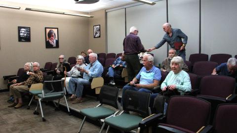 Members of the Foothills Photography Group participate in a discussion on AI and photography. MAE SULLENS/CNI