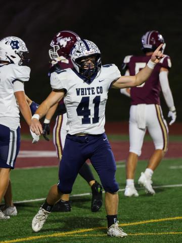 Lucian London celebrates after a Dawson County turnover during the region win last Friday night in Dawsonville. JENNIFER KNIGHT/SPECIAL