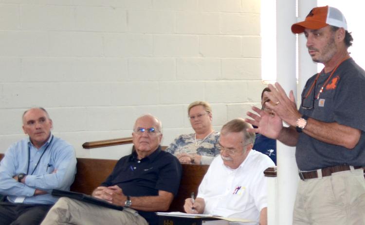 Ward Gann, owner of Clyde’s Table and Tavern and member of DCMA, spoke to the City of Cleveland council about DCMA and their goal for the future of Cleveland. (Photo/Stephanie Hill)