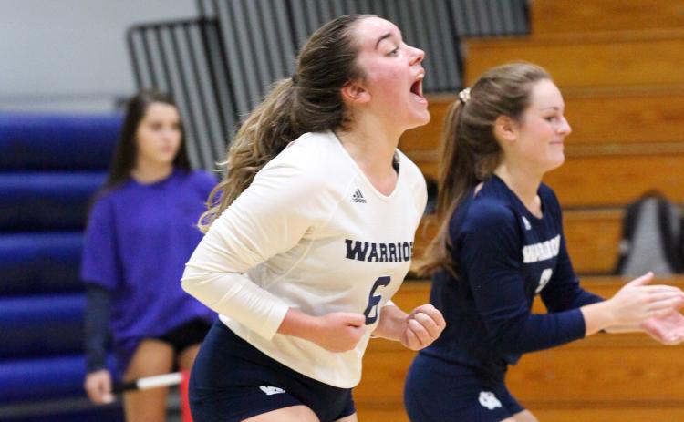 Karlie Burke reacts after a point during the Senior Night win last week over Madison County. (Photo/Staci Sulhoff)