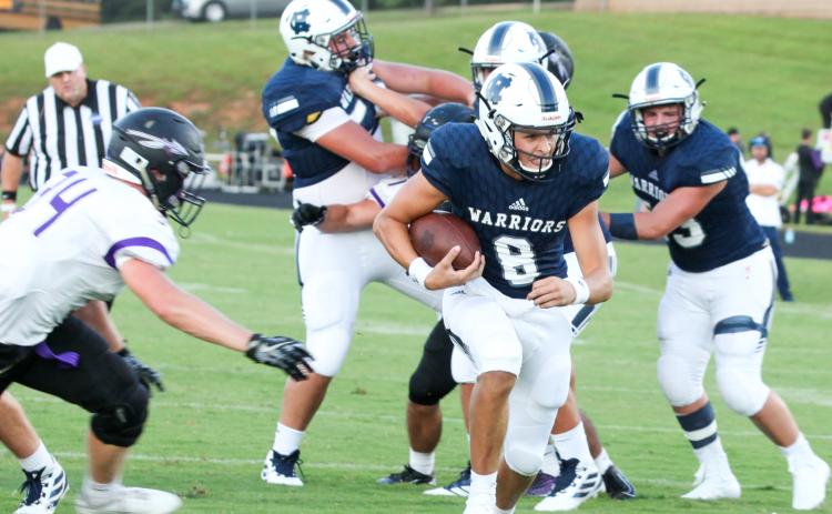 Junior quarterback J. Ben Haynes has passed for 1,295 yards, and rushed for 564 yards this season. (Photos/Staci Sulhoff)