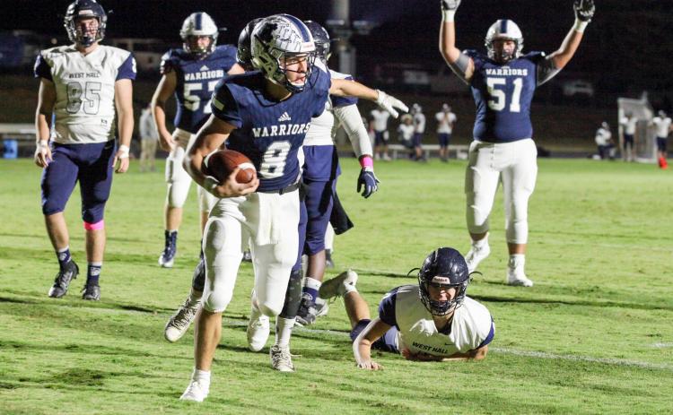 The White County Warriors celebrated Homecoming last Friday night by blasting West Hall 42-0 in a Region 7-AAAA matchup. WCHS quarterback J. Ben Haynes, above, accounted for all six of the Warriors touchdowns, running for three scores and passing for three touchdowns. (Photo/Staci Sulhoff)