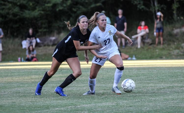 Jennifer McCall, right, scored the game-winning goal in the second overtime period to give the Bears their first AAC tournament title. (Photo/TMU Athletics)