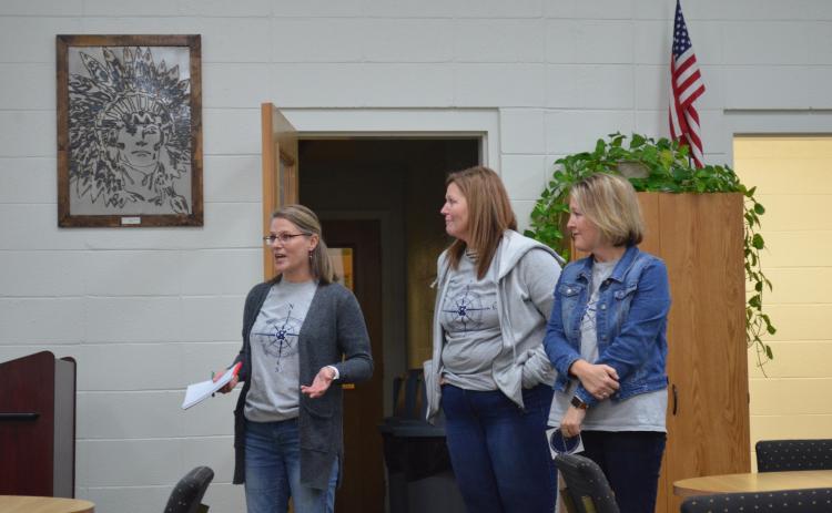 Francesca Smith, school crisis interventionist, Mary Kay Berry, director of student services, and Lindsey Oliver, school social worker, spoke to the school board Dec. 19 about efforts to help students with mental health. (Photo/Stephanie Hill)
