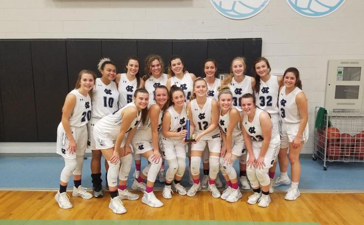 The Lady Warriors show off some Beach Bash hardware after posting a 3-0 record to win the Silver Bracket tournament at the Beach Bash last weekend in Panama City, Fla. (Photo/WCHS Lady Warriors Basketball)