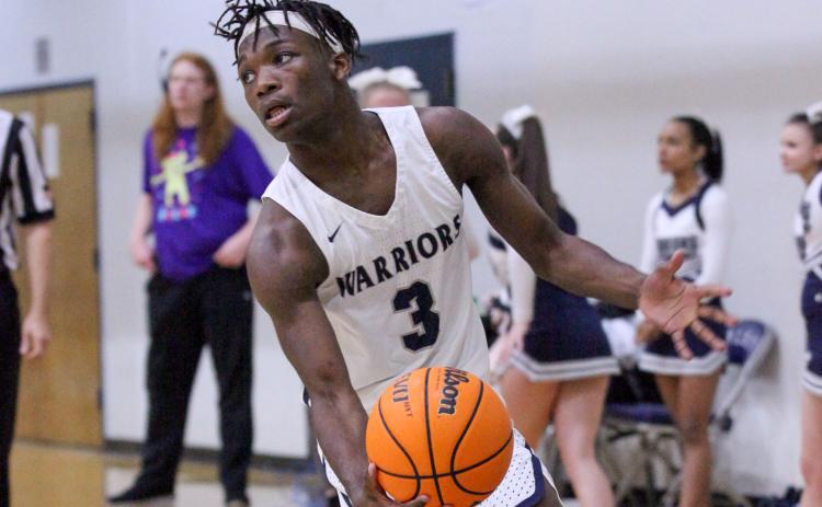 Silas Mulligan scored 16 points in the Warriors' region win over West Hall last Friday night in Cleveland. (Photo/Staci Sulhoff)