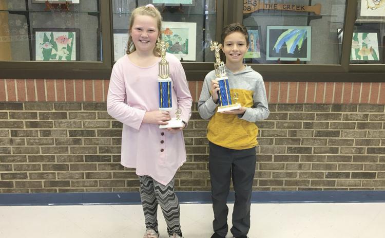 Fifth-grader Alli Daves, left, of Mossy Creek Elementary School, won the system-wide school Spelling Bee out of a field of 84 students. Brayden Gerrell, a fourth-grader also at MCES, was the runner-up. (Submitted photo)