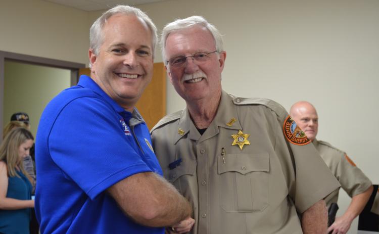 Rick Kelley, left, is congratulated by Sheriff Neal Walden after a successful election night. (Photo/Stephanie Hill)