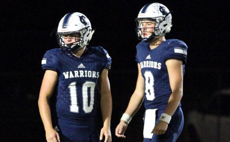 Riley Stancil, leftl, J. Ben Haynes, right, and the Warriors take on Stephens County Friday night in Cleveland in the season opener. (Photo/Mark Turner)