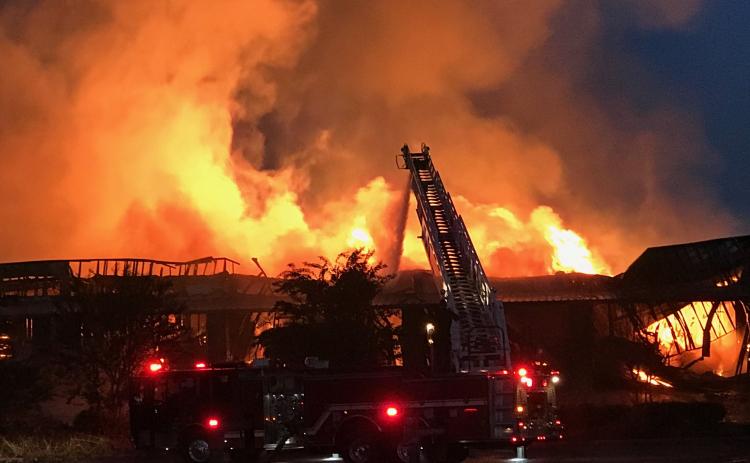 Firefighters battle flames at White County Mouldings early morning on Oct. 22. (Photo courtesy/Carl Dann)