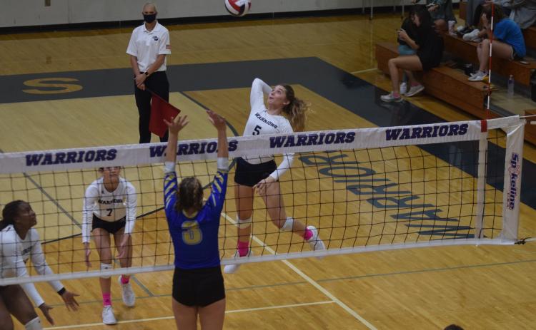 WCHS senior Jenna Ash, the Region 7-AAA Player of the Year, hammers a shot during the win over Ringgold Tuesday in the first round of the Class AAA state tournament. (Photo/Mark Turner)