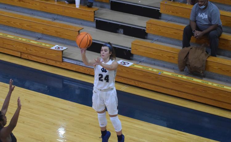 Makenna Moose and the Lady Warriors take on North Hall Saturday afternoon in a 7-AAA game in Cleveland. (Photo/Mark Turner)