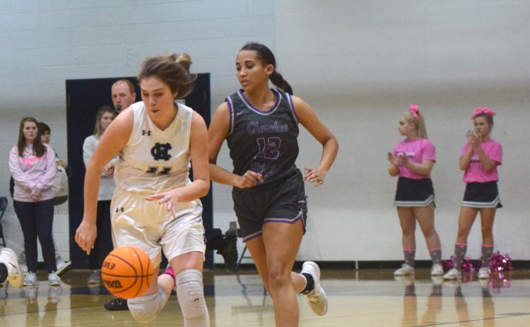 Maddie Futch pushes the ball up the court during the first quarter of the Lady Warriors' region win over Cherokee Bluff. (Photo/Mark Turner)