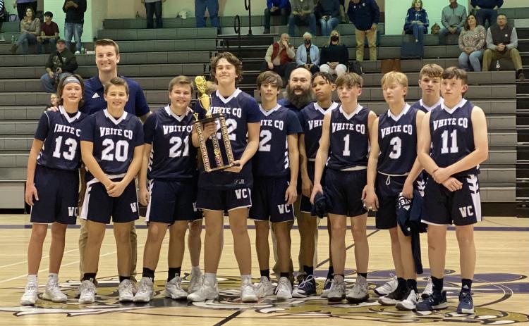 The WCMS eighth-grade boy's basketball team shows off the runner-up trophy following the championship game last Friday at Clear Creek Middle School in Gilmer County. (Photo/Shelton Sweets)