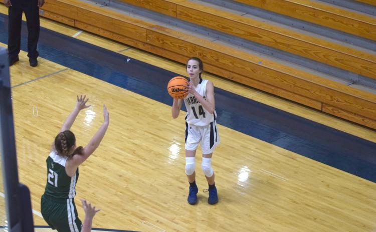 Zoe Burkett had 13 points in the Lady Warriors' win over Dawson County. (Photos/Mark Turner)
