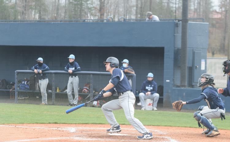 Dylan Sargent rips a double during his first at-bat of the season in the 15-0 win over Johnson last Saturday in Cleveland. (Photos/Mark Turner)