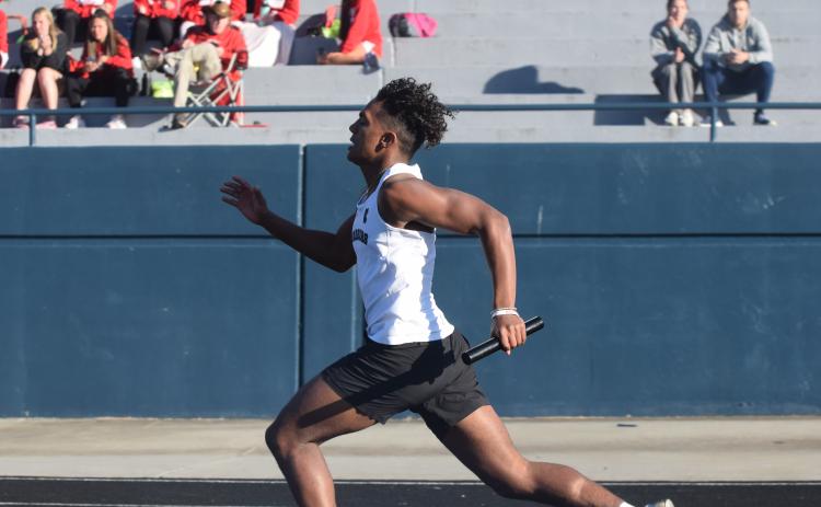 White County's Darius Cannon won a pair of individual events to lead the track teams to the boy's and girl's team titles at the Warrior Invitational last Friday in Cleveland. (Photos/Mark Turner)
