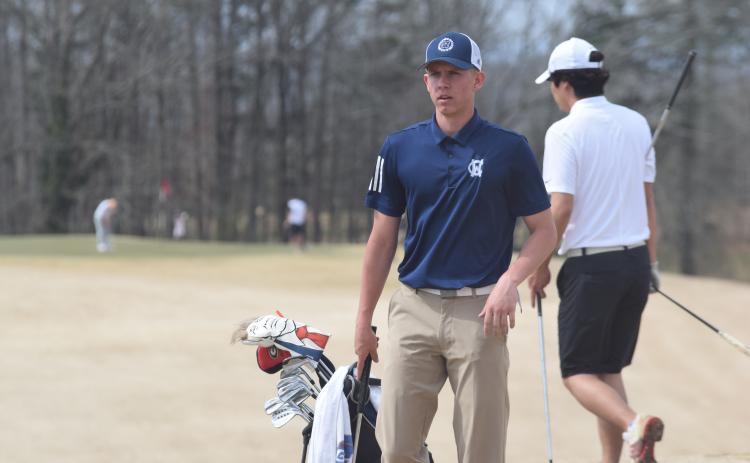 Jacob Adams, who will play the in the No. 1 spot for the Warriors in the area tournament, recently signed with Truett McConnell University. (Photo/Mark Turner)