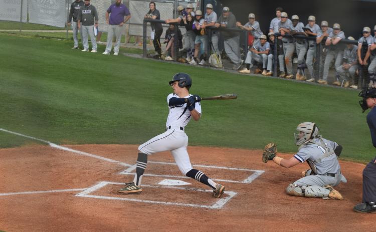 J. Ben Haynes rips a double down the third base line to drive in the Warriors' lone run in an 8-1 loss to Cherokee Bluff last Friday in Cleveland. (Photos/Mark Turner)